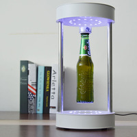 Présentoir de bouteilles à lévitation magnétique et rotatif avec lumière LED