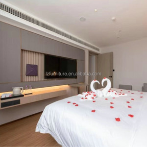 Ensemble de chambre d'hôtel moderne et minimaliste, lit king size en MDF avec tête de lit capitonnée intégrée et tables de chevet, pour hôtel 3 étoiles - Product Image 4