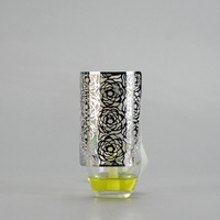 Diffuseur d'arômes à brancher et diffuseur de parfum à brancher avec décoration métallique