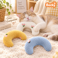 Coussin pour animaux de compagnie en tissu de velours rembourré de coton, durable, couleur personnalisée, doux, en forme de U, écologique, à motif uni, pour un sommeil profond