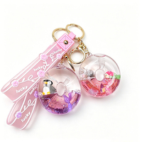 Porte-clés en acrylique en forme de donut avec sable mouvant liquide, pendentif flottant animal marin, breloque de sac, cadeau d'été pour la plage