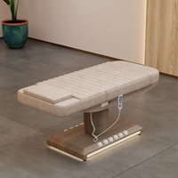 Table de massage rose moderne de luxe lit d'épilation faciale électrique cosmétique lit de cils de salon de beauté incurvé à vendre