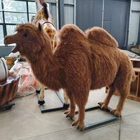 Grand chameau bactrien artificiel animatronique avec tête mobile, bouche qui mâche et sons réalistes pour la décoration de zoos et de parcs à thème désertiques