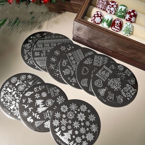 9 Placas de Estampado de Uñas Navideñas con Diseños en Relieve de Copos de Nieve y Alces, Herramientas de Transferencia de Patrones para Arte de Uñas, para Manicura DIY, Salón y Festivales - Product Image 1