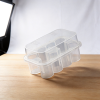 Boîte de rangement transparente en PP, adaptée au stockage et à la distribution de divers liquides, poudres ou huiles.