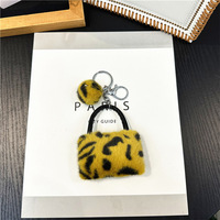 Porte-clés créatif en peluche motif léopard, mini sac à main, porte-clés de voiture, dessin animé mignon pour étudiant, accessoires pendentifs
