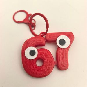 Porte-clés Meme 67 drôle, avec les expressions populaires 6-7 et les formules de slang populaires, accessoire de charme pour sac à dos - Product Image 1