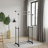 Séchoir à linge télescopique sur pied avec double barre pour le rangement domestique des vêtements