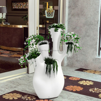 Pot de fleurs créatif YW019 en forme de branche d'arbre pour hall d'hôtel, jardin et complexe hôtelier, en fibre de verre, pour décoration végétale