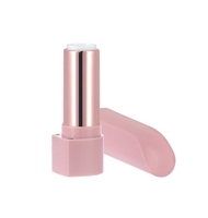 Tube de baume à lèvres magnétique en forme de pouce en ABS rose mat pour cosmétiques matériau d'emballage plat