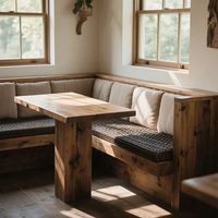 Meubles de restaurant moderne : banquette en tissu en forme de L avec structure métallique et table rectangulaire en bois pour café