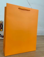 Vente en gros de sacs à provisions en papier cadeaux personnalisés de luxe pour petites entreprises vêtements emballage ruban propre logo bougie
