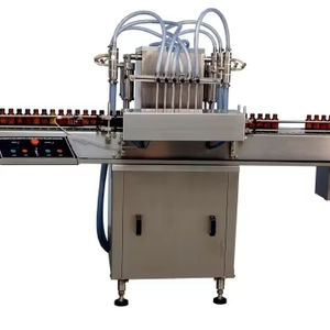 Máquina Automática de Llenado de Líquidos con Múltiples Cabezales para Botellas y Frascos Utilizada en la Industria Alimentaria, de Bebidas y Química - Product Image 1