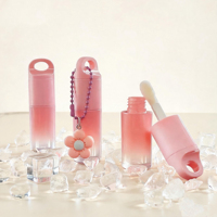 Tube de brillant à lèvres vide rond dégradé rose mignon avec applicateur grand pied de lapin pour emballage cosmétique