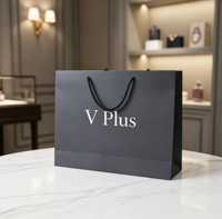 Sacs en papier noir de luxe personnalisables avec longue poignée pour le shopping, les entreprises, les cosmétiques, les cadeaux, avec votre propre logo