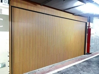 Fabrieksdirecte verkoop moderne elektrische horizontale houten schutting aluminium veiligheids automatische garagedeur panelen strips voor thuisgebruik