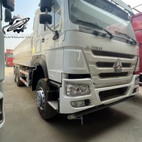 Camion-citerne d'occasion Sinotruk Howo 6X4 de 15 m³ pour le nettoyage des routes, le contrôle de la poussière et l'irrigation des espaces verts