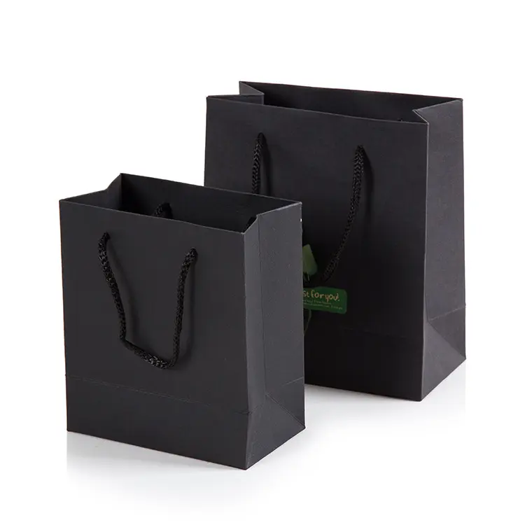 Toptan lüks özel logo baskılı geri dönüşümlü kraft el işi kağıdı alışveriş çantası hediye keseleri kolları ile özel logo