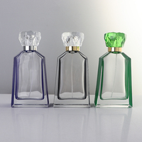 Flacon de parfum vert émeraude trapézoïdal à facettes multiples, forme unique, en verre, 100 ml, avec couvercle en cristal en forme de couronne