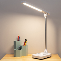 Nouveau design de lampe de bureau pliable à intensité variable pour la maison et le bureau avec support pour téléphone portable éclairage en métal alimentation CC flexible et simple