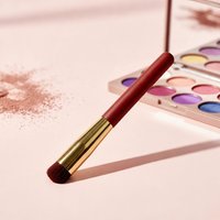 Pinceau correcteur de luxe à pointe ronde avec poils synthétiques et manche en plastique pour le maquillage du visage