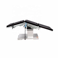 Table d'opération électrique avec cadre en alliage d'aluminium, capacité de charge de 150 kg, lit chirurgical durable