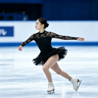 Robe de patinage artistique noire en dentelle à manches longues avec dos découpé pour filles et adultes, idéale pour les compétitions et spectacles sur glace