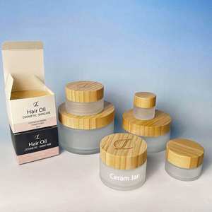 Venta al por mayor 5G 30g 50g 100G 200g vacío esmerilado bambú transparente cara Cuerpo crema cosmética frascos de vidrio tapas de bambú con cajas - Product Image 1