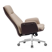Chaise de bureau fixe de luxe au design ergonomique avancé, avec piétement en métal et assise en cuir, pour immeuble de bureaux