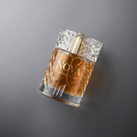 Flacon de parfum en verre cylindrique personnalisé de 50 ml et 100 ml, flacon vide de luxe avec pulvérisateur et bouchon, emballage cosmétique