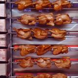 Four à rôtir au gaz à 9 broches en acier inoxydable robuste pour restaurant
