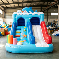 Structure de jeu gonflable combinée avec toboggan et zone de saut pour enfants, idéale pour les fêtes d'anniversaire et la location en maternelle