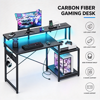 Bureau de jeu en forme de L avec éclairage LED, prises de courant et étagère de rangement, poste de travail informatique réversible en fibre de carbone