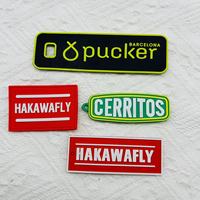 Étiquette en caoutchouc souple 3D personnalisée en gros, patch en silicone PVC, patch en caoutchouc souple pour vêtements
