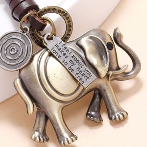 LLavero de Metal de cuero tejido hecho a mano creativo Vintage colgante <span class=keywords><strong>Animal</strong></span> elefante jirafa oso llavero de coche accesorio de decoración - Product Image 3