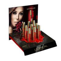 Présentoir de magasin de cosmétiques de luxe personnalisé d'usine OEM présentoir pour eye-liner maquillage présentoir de maquillage en acrylique sur mesure pour comptoir