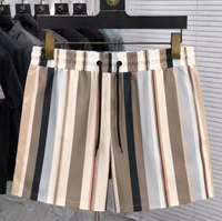 Shorts à carreaux personnalisés pour hommes, 100% nylon, légers, décontractés, pour la plage, avec cordon de serrage, imprimé logo, étiquette brodée, OEM ODM, nouveauté