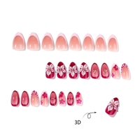 Ongles courts en acrylique rouge et rose nude, forme amande, à presser, avec motif floral 3D et perles étoiles dorées, style français, modèle BOX DESIGN
