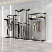Présentoir de vêtements en bois sur mesure pour magasin de vêtements, à la mode