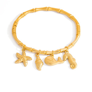 สร้อยข้อมือเสน่ห์ธีมมหาสมุทร ชุบทอง 18K ไทเทเนียมสตีล รูปปลาวาฬ ปลาดาว เปลือกหอย ของขวัญเครื่องประดับสำหรับทุกเพศ - Product Image 5