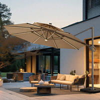 Parasol de terrasse moderne de 9 pieds à énergie solaire avec lumières LED et bouton d'inclinaison pour meubles d'extérieur, jardins, cours, hôtels, plages