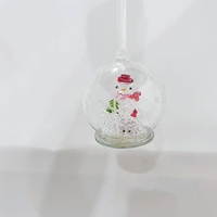 Adorno navideño de vidrio de borosilicato soplado a mano con iluminación LED con muñeco de nieve en el interior para decoración festiva