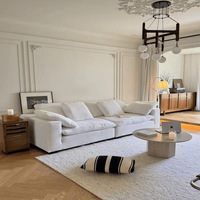 Ensemble modulaire minimaliste italien avec structure en bois massif, revêtement en flanelle, canapé nuage carré avec espace de rangement pour salon