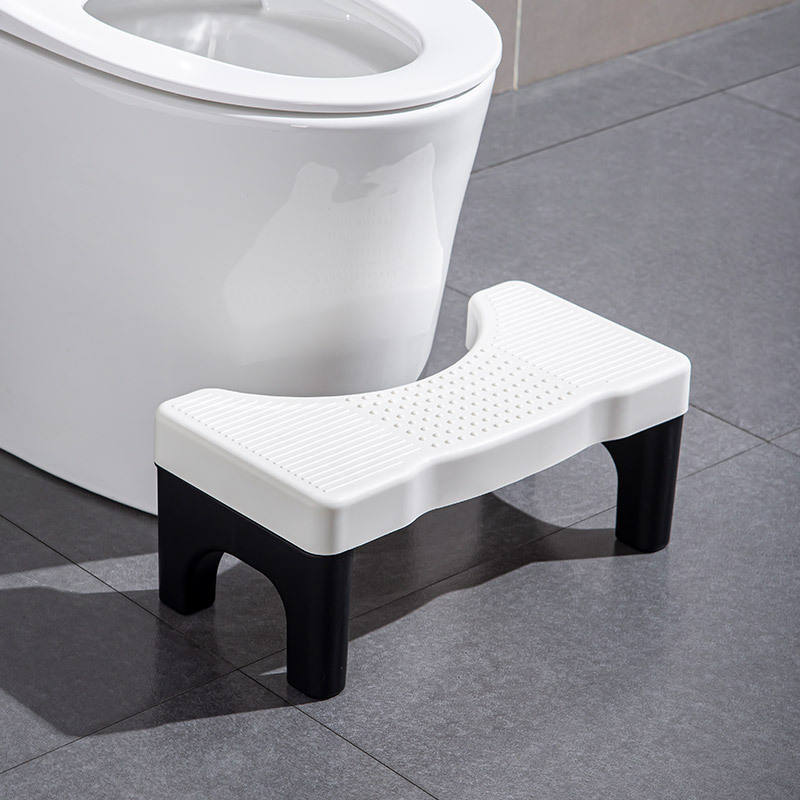 Stool with yellow top and black legs