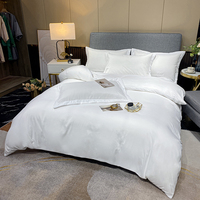 Les textiles d'hôtel sont luxueux et doux, un ensemble de literie 4 pièces adapté à l'utilisation hôtelière