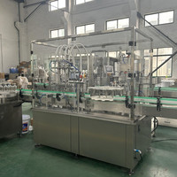 Remplisseuse de liquide linéaire entièrement automatique pour sauce soja spiritueux jus Gin vin vodka tequila remplisseur de bouteille ligne de capsulage