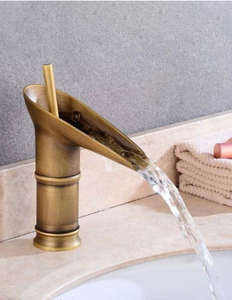 Grifo de lavabo de latón de lujo contemporáneo con una sola manija y un solo orificio, superficie pulida y válvula de cerámica tipo <span class=keywords><strong>cascada</strong></span> - Product Image 1