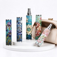 Nouveau flacon pulvérisateur de parfum rond en verre de 10 ml avec motif givré, estampage doré et impression sérigraphiée, diffuseur de roseaux portable