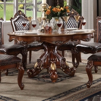 Ensemble de table à manger ronde en bois massif de style européen orné, 6 chaises à dossier haut en cuir incluses, design artisanal respectueux de l'environnement