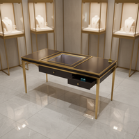 Vitrine de présentation de bijoux MASTER, pieds en acier inoxydable doré, verre anti-explosion, comptoir à bijoux noir, table de négociation